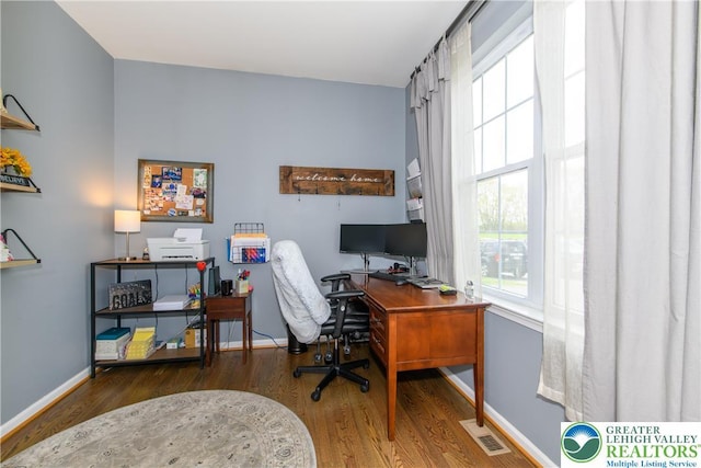 office area featuring wood finished floors and baseboards
