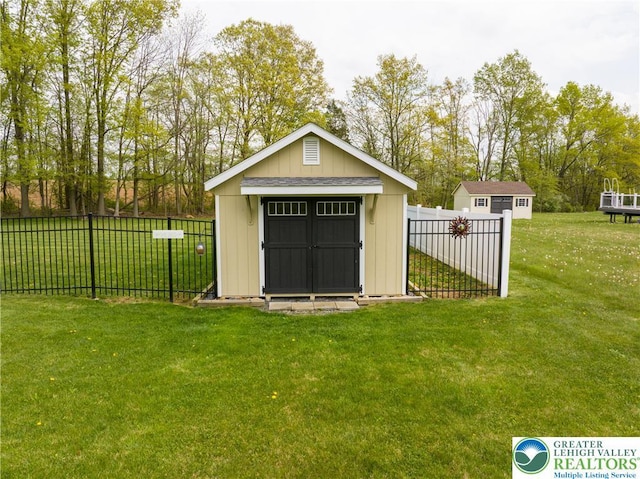 view of shed featuring view of wooded area