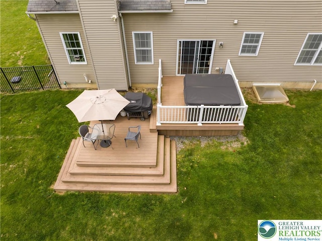 back of property with a wooden deck