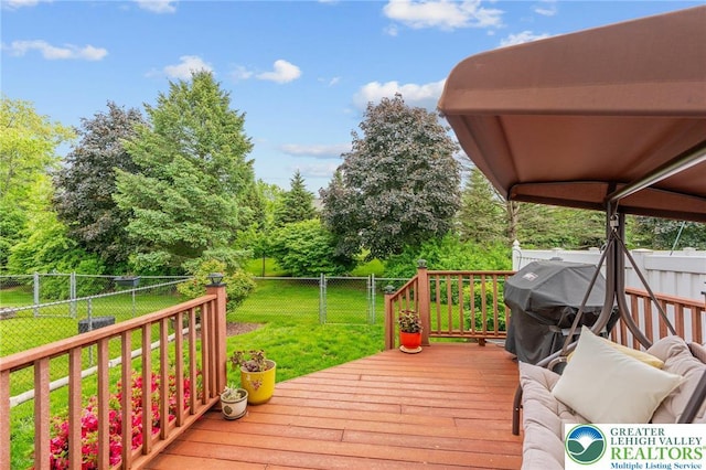 wooden deck with area for grilling