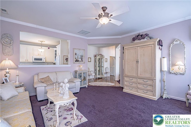 living area with dark carpet, a ceiling fan, and crown molding