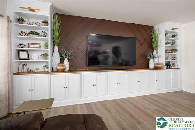 living room featuring light wood-style floors