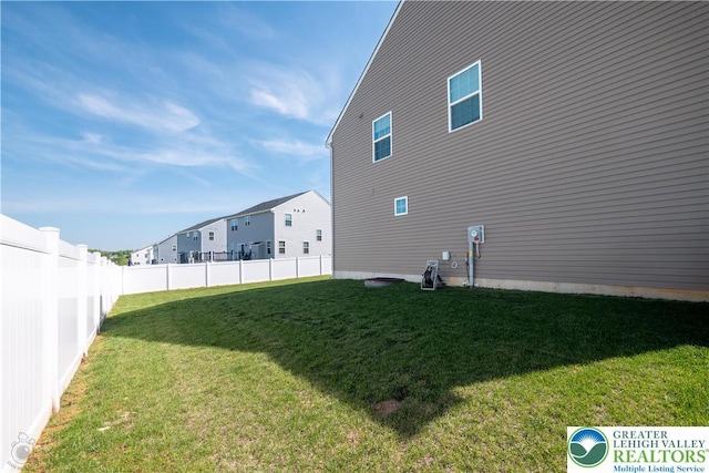 view of yard with a residential view