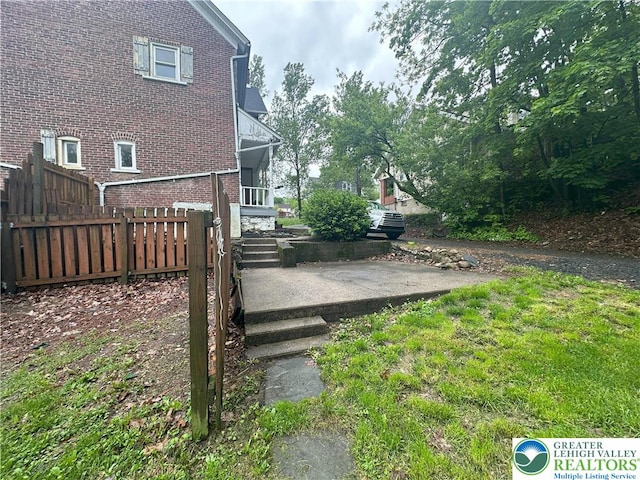 view of yard featuring fence