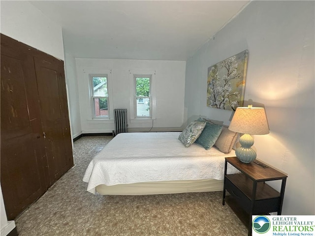 bedroom featuring radiator heating unit