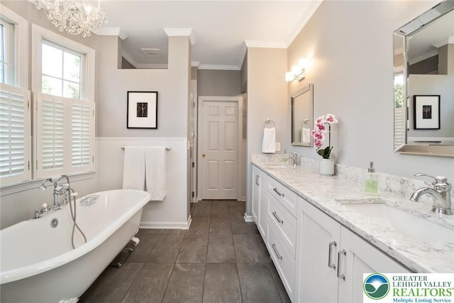 full bathroom with a soaking tub, crown molding, double vanity, a wainscoted wall, and tile patterned flooring