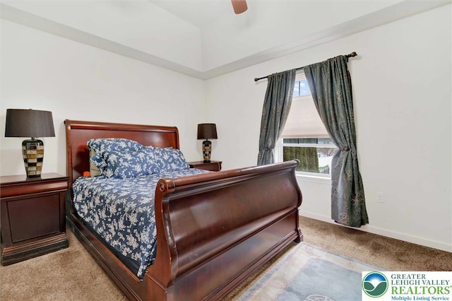 carpeted bedroom with baseboards and ceiling fan