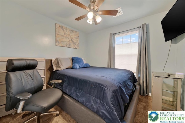 carpeted bedroom with a ceiling fan