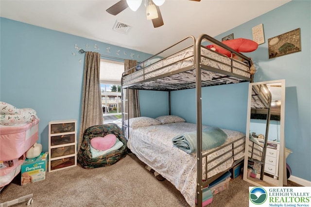 bedroom with carpet floors and a ceiling fan