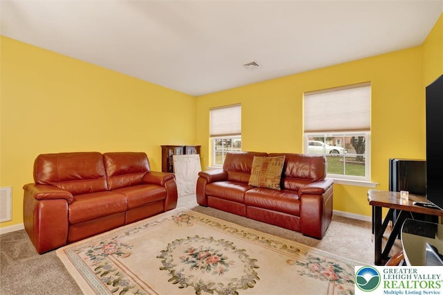living room with carpet flooring and baseboards