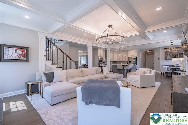 living area with a chandelier, crown molding, dark wood-style flooring, beamed ceiling, and coffered ceiling