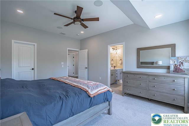 bedroom featuring connected bathroom, light colored carpet, recessed lighting, and a ceiling fan