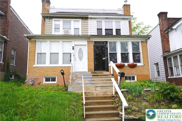 330 18th St, Allentown City, PA 18104 - view of front of property with entry steps, a chimney, and brick siding