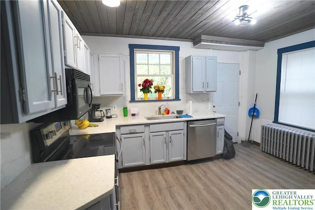 330 18th St, Allentown City, PA 18104 - kitchen featuring stainless steel appliances, radiator, light countertops, a sink, and wood ceiling