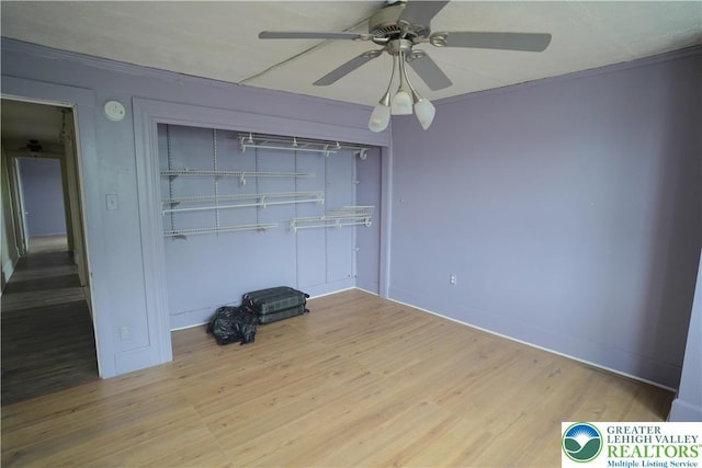 330 18th St, Allentown City, PA 18104 - unfurnished bedroom featuring wood finished floors, a closet, ceiling fan, baseboards, and ornamental molding