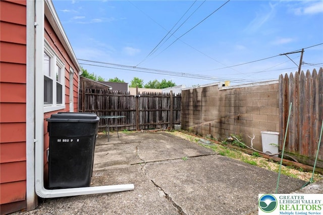 view of patio / terrace with fence