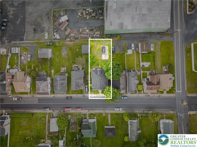 aerial perspective of suburban area featuring property parcel outlined