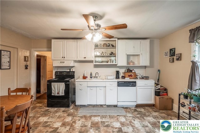 kitchen with black electric range, dishwasher, open shelves, light countertops, and a sink