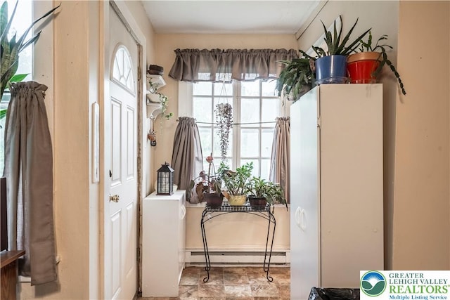 entryway featuring a baseboard radiator