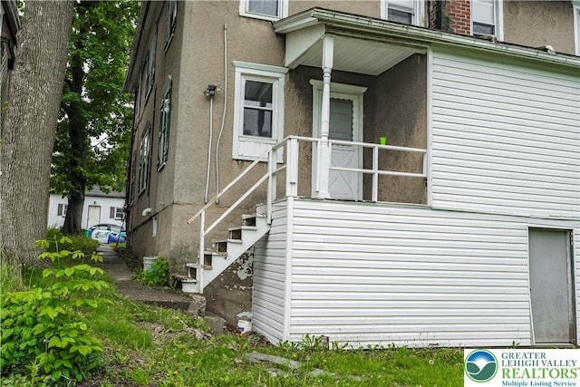 view of property exterior with stucco siding