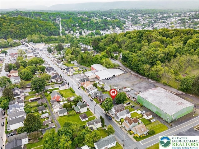 aerial overview of property's location featuring nearby suburban area