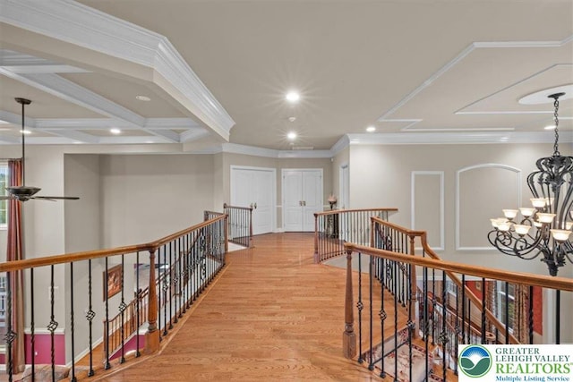 217 Rising Meadow Way, Middle Smithfield Twp, PA 18302 - hallway with an upstairs landing, a chandelier, light wood-type flooring, recessed lighting, and ornamental molding