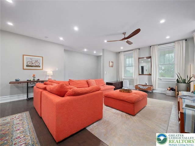 living room featuring ceiling fan, recessed lighting, wood finished floors, and baseboards