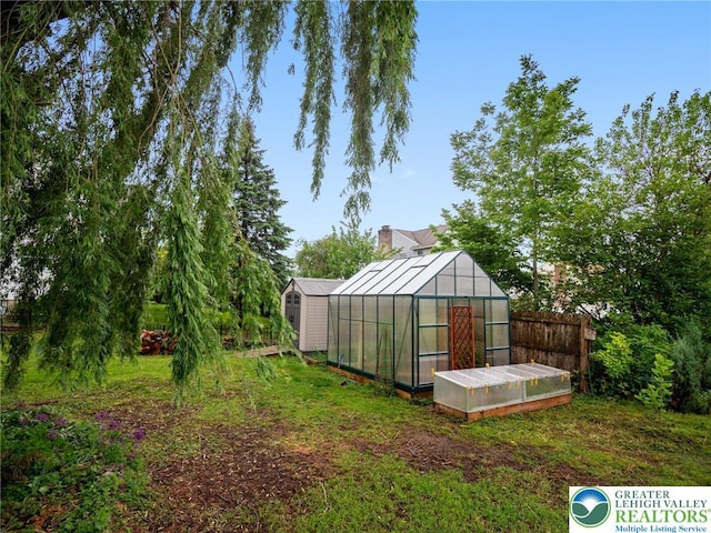1942 Schadt Ave, Whitehall Twp, PA 18052 - view of yard featuring an exterior structure, an outbuilding, and fence