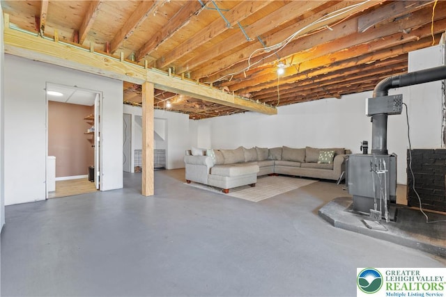 basement featuring a wood stove