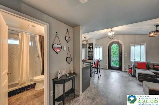 304 Ruger Ln, Coolbaugh Twp, PA 18466 - entryway featuring baseboards and a chandelier