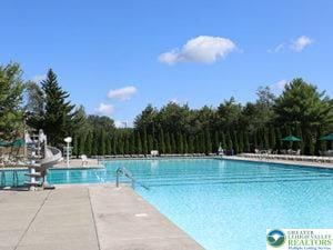 304 Ruger Ln, Coolbaugh Twp, PA 18466 - community pool featuring a water slide