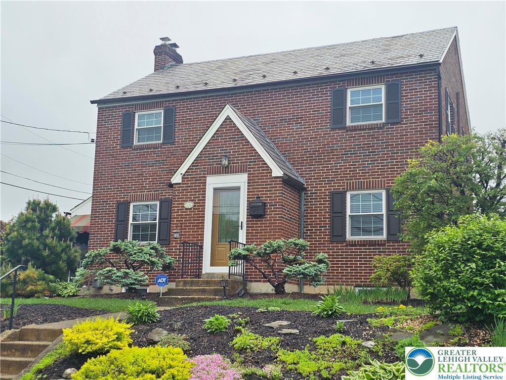 1434 Jennings St, Bethlehem City, PA 18017 - view of front of home with brick siding and a chimney