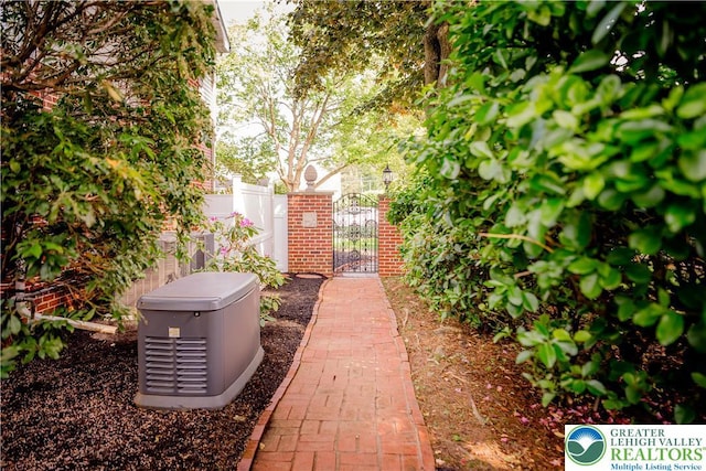 view of yard with a gate and fence