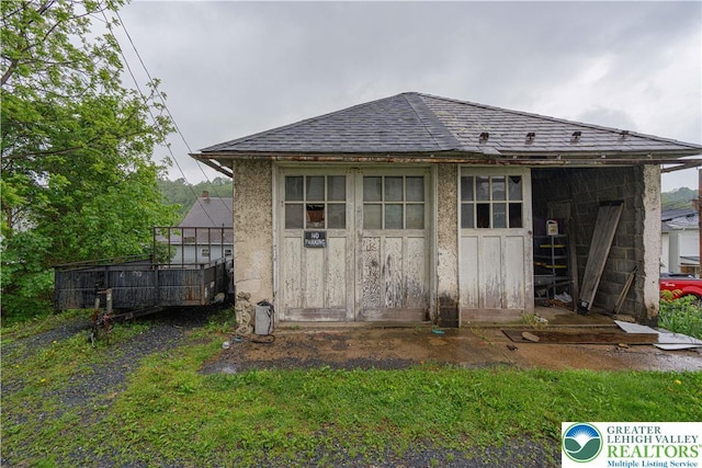 603 S Main St, Bangor Borough, PA 18013 - rear view of house featuring roof with shingles and an outdoor structure