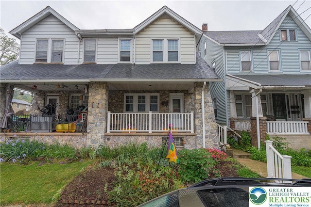 603 S Main St, Bangor Borough, PA 18013 - townhome / multi-family property featuring a porch, stone siding, and a shingled roof
