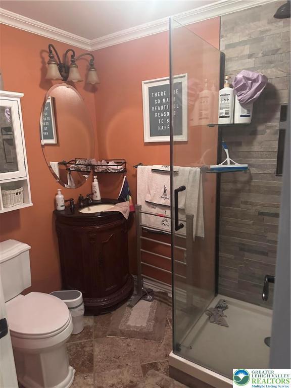 131 Winding Way, Washington Twp, PA 18013 - bathroom with ornamental molding, toilet, a shower stall, and vanity