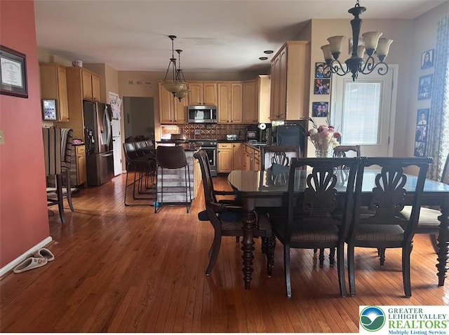 131 Winding Way, Washington Twp, PA 18013 - dining area featuring a chandelier and hardwood / wood-style floors