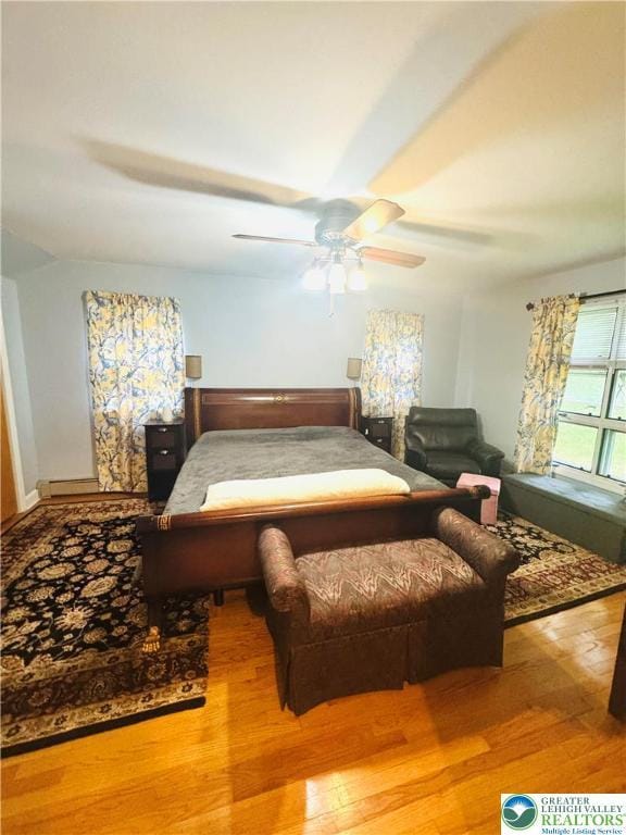 3516 Pine Ave, Saint Lawrence, PA 19606 - bedroom with wood finished floors and a ceiling fan