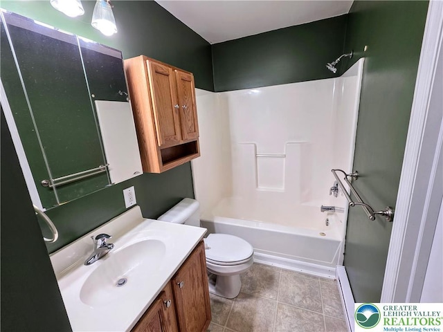 full bath with toilet, bathing tub / shower combination, vanity, tile patterned flooring, and a baseboard radiator