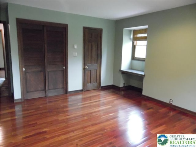 5023 Church Dr, North Whitehall Twp, PA 18037 - unfurnished bedroom featuring wood finished floors and baseboards
