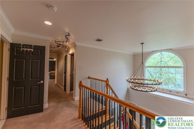 803 Birch Ave, Pen Argyl Borough, PA 18072 - hall featuring an upstairs landing, a chandelier, carpet flooring, ornamental molding, and baseboards