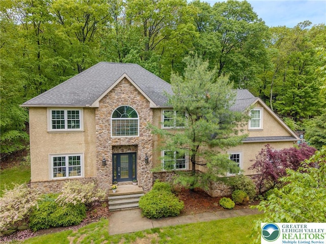 803 Birch Ave, Pen Argyl Borough, PA 18072 - view of front of home featuring stone siding, stucco siding, and roof with shingles