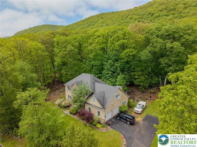 803 Birch Ave, Pen Argyl Borough, PA 18072 - aerial view of property and surrounding area featuring a heavily wooded area