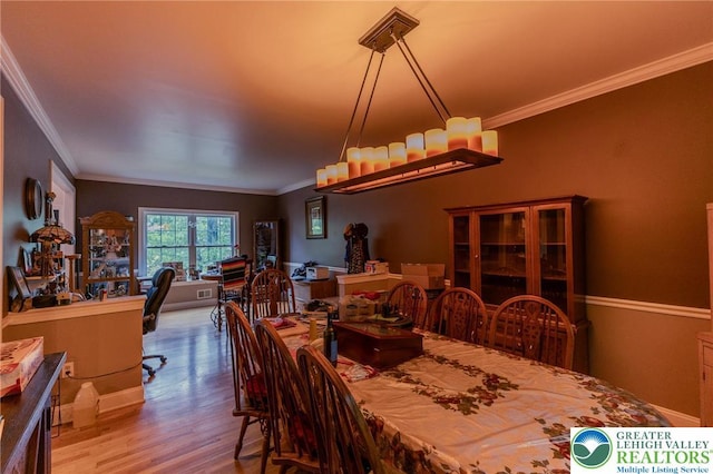 803 Birch Ave, Pen Argyl Borough, PA 18072 - dining room featuring ornamental molding and wood finished floors