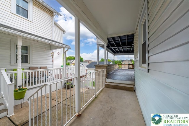 view of patio featuring a porch
