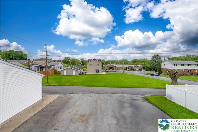 view of yard with a residential view