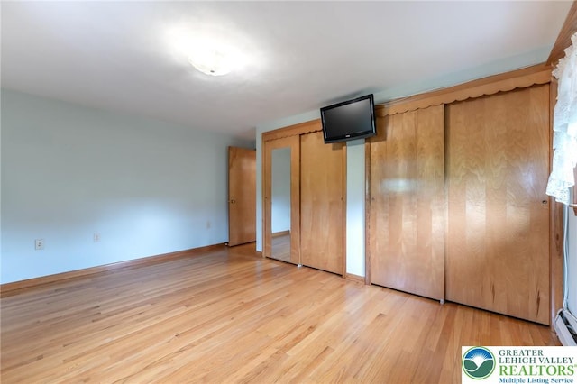 1195 Hemlock St, Lower Towamensing Tp, PA 18071 - unfurnished bedroom featuring two closets and light wood-style flooring