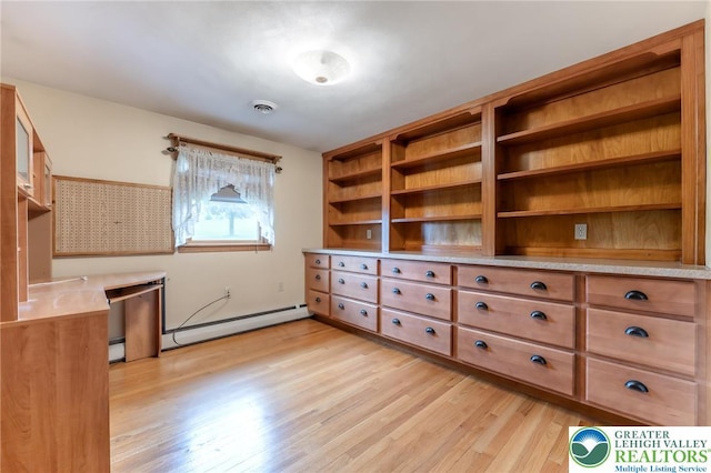 1195 Hemlock St, Lower Towamensing Tp, PA 18071 - unfurnished dining area with a baseboard heating unit and light wood-style flooring
