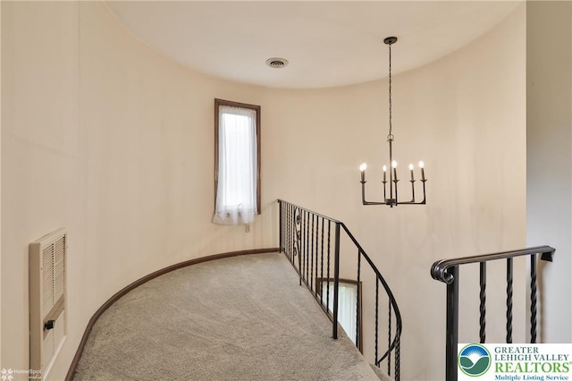 6379 Winding Rd, Upper Saucon Twp, PA 18036 - stairs featuring a chandelier, carpet, heating unit, and baseboards