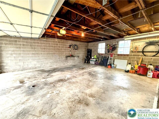 213 Main St, Pen Argyl Borough, PA 18072 - garage featuring concrete block wall